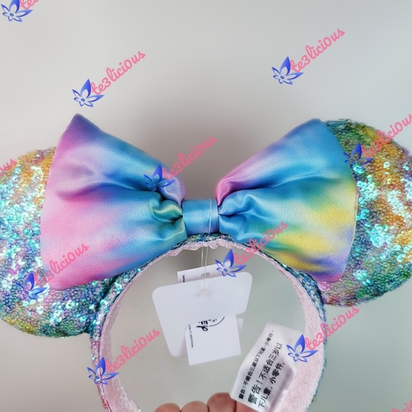 DISNEY PARKS RAINBOW PASTEL EARS HEADBAND - Picture 2 of 5